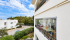 Mediterranean Condo Overlooking a Coastal Neighborhood.png